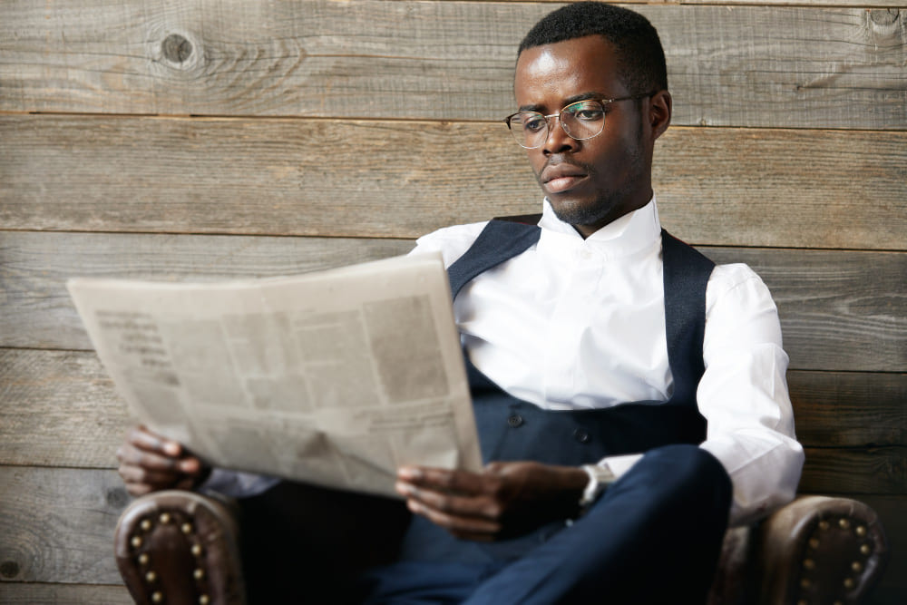 distinguished man with a newspaper